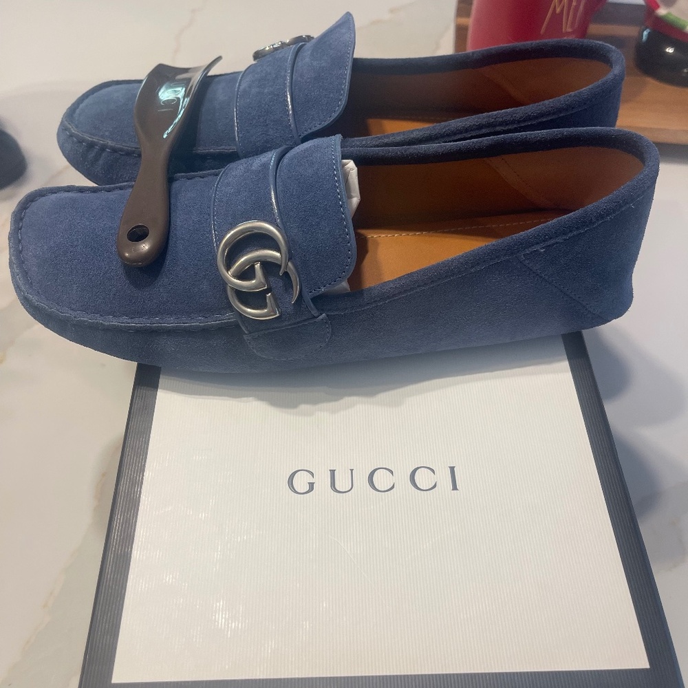 Men’s Gucci slip ons